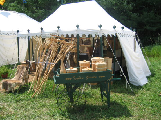 Tent example with cart selling goods in front of it