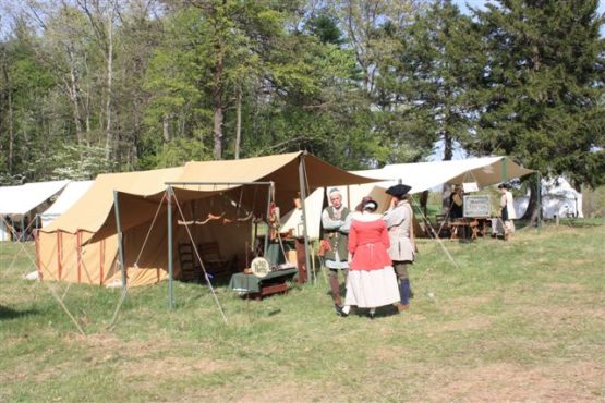 Tan wall tent with awning