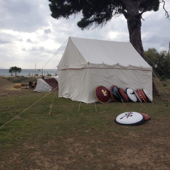 White canvas tent with a closed up door