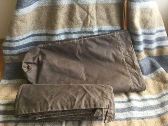 oilskin bag & tarp on blanket