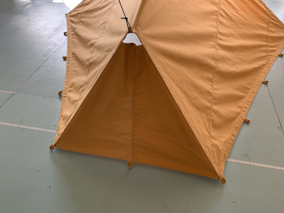 Back of tan tent