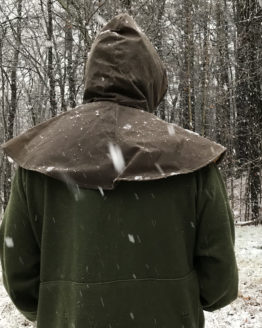 Back view of a man wearing a brown oilskin hood