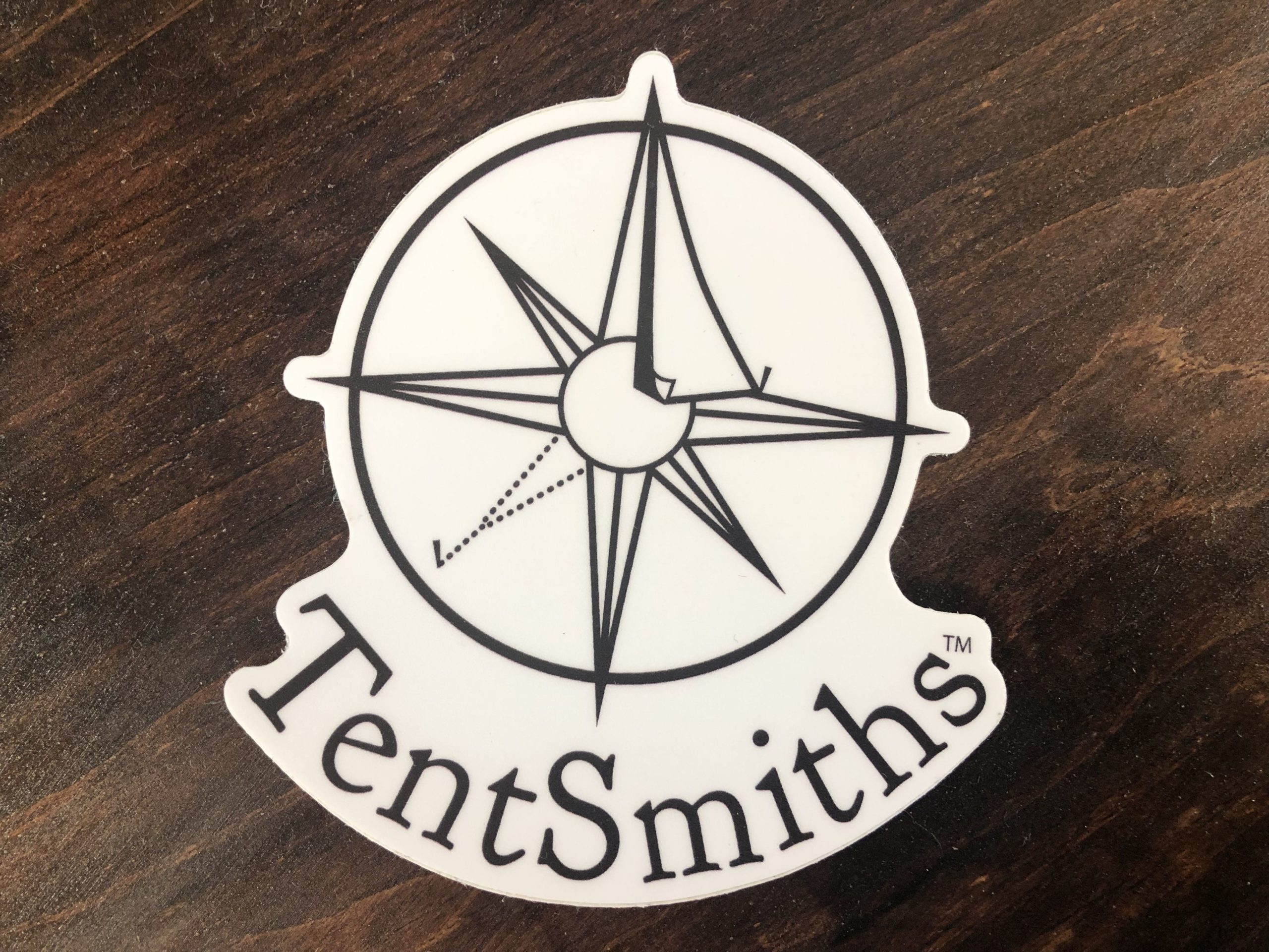 Tentsmiths Logo on wooden background